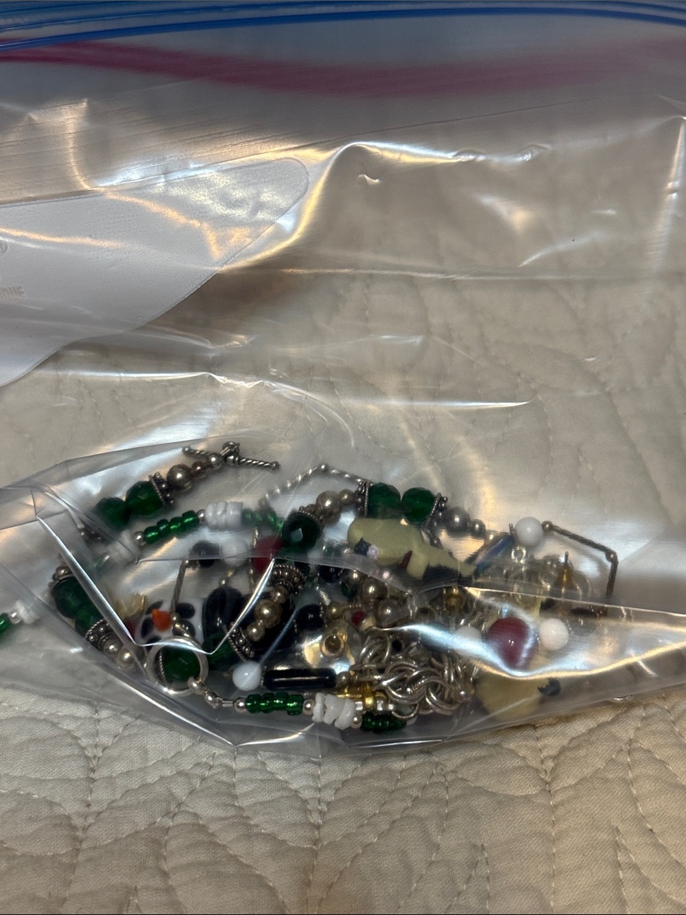 Small bag of Christmas jewelry